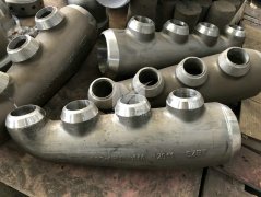 Outlet header castings